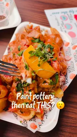 Pottery painting night at Swansea's Albert Hall with food from Burger Boyz and The Rock and Scallop, featuring cocktails.