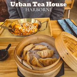 Visitors enjoying tea at Urban Tea House in Harborne, Birmingham, UK.