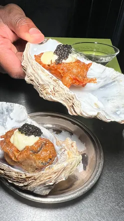 Romantic date night at Noisy Oyster in Shoreditch with delicious food and cozy ambiance.