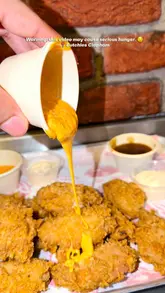 A fast-paced montage showcasing various fried chicken dishes, including burgers, tenders, wings, and sides like mac and cheese, at Butchies Clapham.