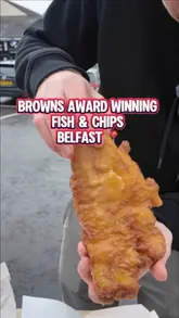 Customers enjoying award-winning fish and chips at Browns in Belfast.