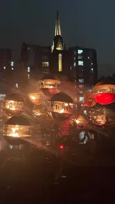 A montage of various light and fire art installations at the Spectra festival in Aberdeen, showcasing the atmospheric and immersive nature of the event at night.