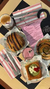 A visually appealing reel showcasing a brunch collaboration between Cafe Ciel and Buns From Home, featuring aesthetic shots of various pastries, cloud-themed eggs, and coffee drinks.