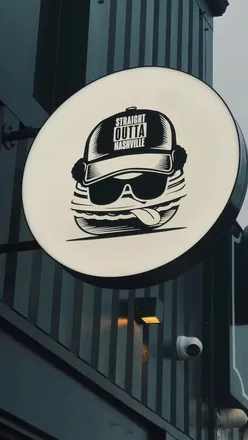 Excited customers at a favorite Bolton eatery promoting chicken loaded fries and a 50% off deal.