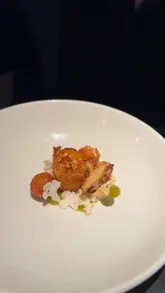 A montage showcasing the 6-course tasting menu experience at Six by Nico, featuring shots of the restaurant exterior, interior, and various plated dishes.