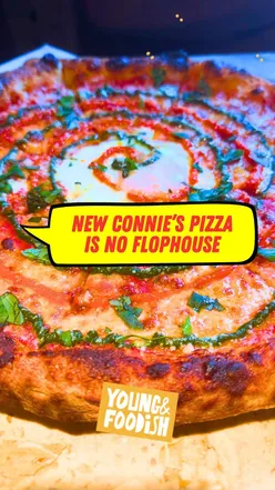 Andrea (Donndre) with a crisp, American-style pizza at Connie's Pizza, his new restaurant in Peckham.