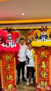 A recap of a Lunar New Year dining collaboration at the Celtic Manor Resort, featuring MasterChef personalities Ping Coombes and Larkin Cen. The video showcases the event atmosphere, including a traditional lion dance performance, table settings, and a multi-course Chinese-inspired menu.