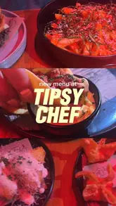 A promotional reel showcasing the new menu at Tipsy Chef in Preston, featuring close-ups of burgers, tacos, dumplings, and cocktails in a moody, dimly lit setting.