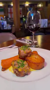 Delicious meal at The Welsh House Cardiff, featuring potted pig, Welsh rarebit, seabass, and honey roasted lamb.
