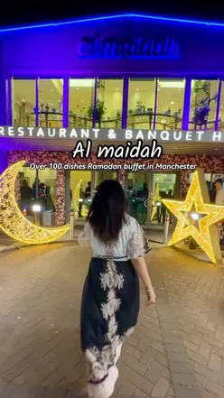 Guests enjoying a diverse Ramadan buffet at Al Maidah in Manchester, featuring lamb chops, kebabs, and a kids' corner.