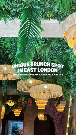 Delicious brunch at Beans & Bites in London, featuring pistachio pancakes, scrambled eggs, and refreshing drinks.