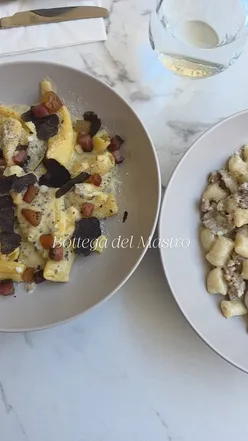 Creamy burrata with grilled vegetables, truffle rigatoni, and gnocchi with Italian sausage at Bottega Del Mastro, Winchester.