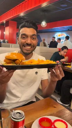 Delicious Dynamite Prawn Burger at Jimmy's Killer Prawns in Manchester, a must-try for seafood lovers!