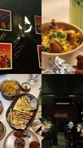 A montage-style promotional video for Masakali, an Indian restaurant in London. The video features close-up shots of various dishes including samosa chaat, curries, naan, and desserts, interspersed with shots of the bar area and the restaurant's exterior.