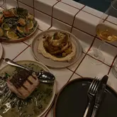 Delicious small plates at @_long_friday_ in Newcastle, featuring focaccia, duck leg, and a stunning wine selection.