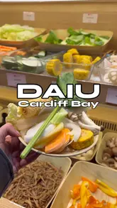 Vibrant spread of Korean BBQ meats, fresh hotpot ingredients, and sushi dishes at DaiU, a fusion buffet in Cardiff Bay.