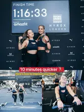 A HYROX doubles team celebrating their personal best after finishing a demanding HYROX race with strategy and fitness.