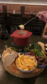 A short, engaging reel showcasing a cheese fondue dining experience at The Residence in Milton Keynes. The video features close-up shots of the food, the restaurant's interior, and live music, creating an inviting atmosphere for a night out.