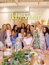 Here are a few options for your SEO alt text, depending on what the photo highlights most:

**Option 1 (Focus on the decor/vibe):**
Stunning baby shower decor and floral arrangements at Bourne & Hollingsworth in London.

**Option 2 (Focus on the celebration):**
Beautiful mom-to-be celebrating at a stylish London baby shower with friends and floral decorations.

**Option 3 (Focus on the details):**
Elegant baby shower celebration in London featuring a custom cake, luxury goodie bags, and floral party decor.

**SEO Tip:** I recommend **Option 2** if you are in the photo, as it includes descriptive keywords that capture both the person and the location, which helps with search visibility.