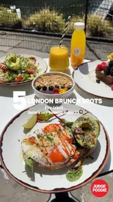 London brunch spot with various dishes, including full English breakfast, pastries, and avocado toast.