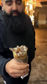 Delicious Syrian shawarma from Tarbushi with fresh herbs and sauce
