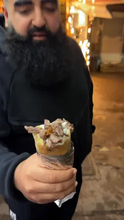 Delicious Syrian shawarma from Tarbushi with fresh herbs and sauce