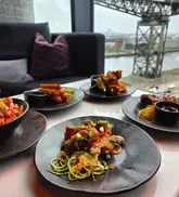 📍RADISSON RED, SKY BAR, GLASGOW [invited] 

If you like boujee cocktails, tasty small plates and the best views of Glasgow - @radissonredglasgow is the place ✨️
I was kindly invited to try the gorgeous Sky Bar at the top of Radisson Red last week and I was so impressed! The decor is stunning, comfy seats and amazing choice of cocktails (literally any cocktail and they can make it 🍸) 
Cocktail wise, we tried the Blood Orange Skyline Sour and the Pornstar Martini, both delish 👌 For food, we had some of the nibbles/small plates; Halloumi Fries, Thai Dirty Fries, Chicken Tikka Skewers, Haggis Sausage Roll (my fave 🙌) and Thai Fried Chicken.
I had visited here before, only for drinks but was honestly so pleasantly surprised with the food! Really flavourful, big portions and presented so well! Me and my Mum had such a lovely day here and when Summer (eventually) arrives this is perfect place to go 🌤
Thanks again for having us @dirtcomms @radissonredglasgow