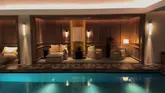 A cinematic, slow-paced tour of the spa facilities at The Chancery Rosewood, showcasing the pool, jacuzzi, sauna, and relaxation areas with a focus on the luxury interior design.