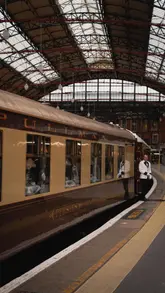 A vlog-style video documenting a luxury day trip on the British Pullman train from London to Bath, showcasing the opulent train interiors, high-end dining service, and the destination.