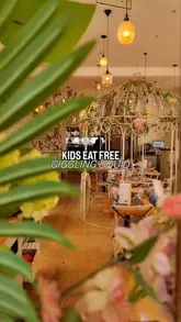 Family enjoying Giggling Squid Bath's free kids tapas and adult Thai mains for the Easter deal.