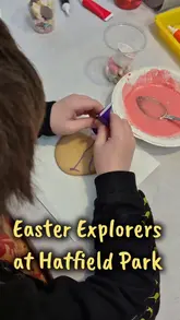 The video features a family day out at Hatfield Park, highlighting an Easter-themed woodland trail and a biscuit-decorating workshop for children.