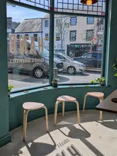 Interior of Hand Llanrwst, a new takeaway coffee and sandwich shop, showcasing local coffee, bakery, and sandwiches.