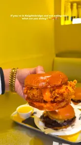 Here are a few options for your SEO alt text, all under 125 characters:

**Option 1 (Focus on the brand):**
Iconic GOAT Burger and loaded fries served at the new GOAT Burger London restaurant in Knightsbridge.

**Option 2 (Descriptive):**
A delicious gourmet burger and loaded fries from GOAT Burger London on Brompton Road.

**Option 3 (Punchy):**
Gourmet GOAT Burger, loaded fries, and refreshing drinks at GOAT Burger’s new London location.