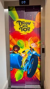 A walkthrough tour of the 'Draw with Rob' exhibition at St Albans Museum + Gallery, showcasing the interactive drawing areas, book displays, and the visitor gallery wall.