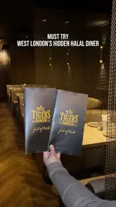 A montage-style video showcasing a variety of dishes and the interior of Tiger Diner in Shepherd's Bush, featuring quick cuts of burgers, lamb shank, loaded fries, and mocktails.