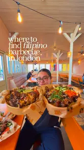 A creator visits FiliGrillz in Hackney Bridge to promote the Filipino Food Crawl event. The video features close-ups of various Filipino BBQ dishes, including pork liempo and fried siomai, while explaining how to participate in the stamp card promotion to win prizes.