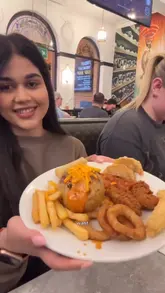A video review of an all-you-can-eat baked potato buffet at Hot World Cuisine, showcasing the variety of toppings and the buffet experience.