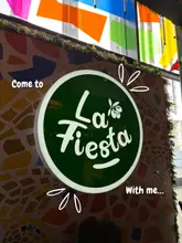 Here are a few options for your SEO alt text (under 125 characters):

**Option 1 (Descriptive & SEO focused):**
Table filled with various Spanish tapas dishes and drinks at La Fiesta restaurant in Leeds city centre.

**Option 2 (Action-oriented):**
A spread of all-you-can-eat tapas including prawns, halloumi, and beef at La Fiesta Leeds.

**Option 3 (Simple & punchy):**
Selection of delicious Spanish tapas dishes from the buffet menu at La Fiesta restaurant in Leeds. 

**SEO Tip:** Always include the location (Leeds) and the business name (La Fiesta) to help local customers find your content!
