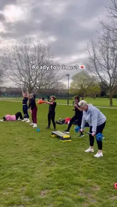 Here are a few options for your SEO alt text, keeping it under 125 characters:

**Option 1 (Descriptive & SEO-focused):**
Group of women training outdoors at a Camp Reevamp fitness bootcamp in Upminster on a sunny day.

**Option 2 (Action-oriented):**
Women participating in an outdoor small group fitness bootcamp session with Reevamp Fitness.

**Option 3 (Short & Punchy):**
A supportive group of women enjoying an outdoor fitness bootcamp class in Upminster.

**SEO Tip:** I included "Upminster" and "fitness bootcamp" as these are your primary local keywords!