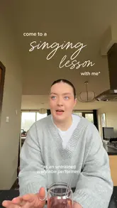Here are a few options for your alt text, depending on what is actually shown in the photo:

**Option 1 (Focus on the activity):**
"A woman singing during a vocal coaching session with her teacher to practice new singing techniques."

**Option 2 (Descriptive):**
"Close-up of a woman practicing vocal exercises and singing during a music lesson with her vocal coach."

**Option 3 (Short & punchy):**
"A student practicing singing techniques during a vocal coaching session."

**SEO Tip:** Since alt text is for accessibility and search engines, it is best to describe the **visual action** (what is happening in the photo) rather than the emotional caption. Including keywords like "singing lesson" and "vocal coach" will help your SEO.
