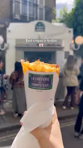 A short, handheld video showcasing La Crêperie de Hampstead, highlighting the popular street food stall, the queue, and the cheesy crepe being prepared and served.