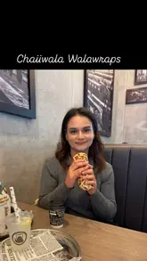 Here are a few options for your SEO alt text, keeping under the 125-character limit:

**Option 1 (Descriptive):**
Delicious chicken tikka and mixed kebab Chaiiwala wraps being enjoyed by a family in Milton Keynes.

**Option 2 (Action-oriented):**
Woman eating a flavorful chicken tikka Walawrap at the Chaiiwala restaurant in Milton Keynes.

**Option 3 (Brand-focused):**
Tasty chicken tikka and kebab Walawraps from Chaiiwala, a perfect healthy treat for the family. 

**SEO Tip:** Always prioritize describing the actual visual content (the food and the brand) while including the location (Milton Keynes) for better local search results.