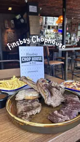 A montage showcasing the interior and food offerings at Finsbay Chophouse, featuring their 'all in' steak platter, sides, and drinks.