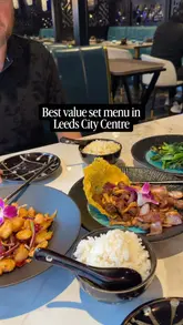 Here are a few options for your alt text, depending on what is actually shown in the photo:

**Option 1 (Focus on the meal):**
"A delicious spread of the Easter set menu at Blue Pavilion Chinese restaurant in Leeds including duck pancakes."

**Option 2 (Focus on the experience):**
"Diners enjoying a variety of Chinese dishes from the Easter set menu at Blue Pavilion restaurant in Leeds."

**Option 3 (Detailed/SEO focused):**
"Table filled with Chinese dishes like salt and pepper chicken and duck pancakes at Blue Pavilion restaurant in Leeds."

**Best practice tip:** If the image is a close-up of a specific dish (like the duck pancakes or beef), swap "Chinese dishes" for the specific food name to help with image search rankings!