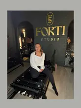 Here are a few options for your SEO alt text (all under 125 characters):

**Option 1 (Descriptive & SEO-focused):**
A woman practicing reformer Pilates at Forti Studio in Glasgow, focusing on slow, high-resistance movements.

**Option 2 (Action-oriented):**
Woman in a stylish workout outfit taking a beginner-friendly, low-impact reformer Pilates class at Forti Studio Glasgow.

**Option 3 (Concise):**
Person doing a low-impact reformer Pilates exercise session at Forti Studio in Glasgow wearing Elena Apparel activewear.

**SEO Tip:** The first option is generally best as it hits the location (Glasgow), the activity (reformer Pilates), and the specific studio name (Forti Studio).