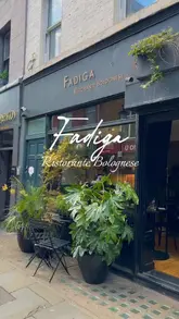 A montage showcasing the interior and various pasta dishes at Fadiga Ristorante Bolognese in Soho, featuring a variety of handmade pasta and cocktails.