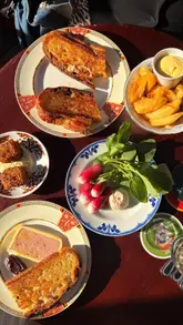 A short, energetic review of The Smithfield pub in Leeds, featuring a tour of the interior, shots of various small plates and bar snacks, and the creator enjoying the atmosphere during golden hour.