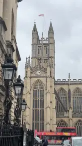 A travel vlog documenting a weekend trip to Bath, featuring a spa treatment, city sightseeing, dining at a pasta restaurant and a dessert cafe, and a scenic viewpoint.
