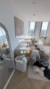 Here are a few options for your SEO alt text (under 125 characters):

*   **Option 1 (Descriptive):** A person deep cleaning a bright, modern apartment living room during a Sunday reset routine in Manchester.
*   **Option 2 (Action-oriented):** Close-up of cleaning supplies and a tidy living space during a productive Sunday reset deep clean.
*   **Option 3 (SEO-focused):** Sunday reset deep cleaning session in a Manchester apartment, featuring a clean living area and supplies.

**Tip:** Search engines prefer descriptive, natural language. **Option 1** is generally the best for accessibility and SEO.