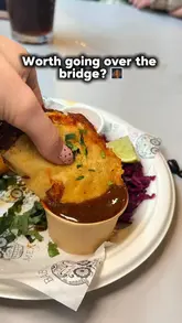 A fast-paced review of Newport Market, highlighting various food traders and dishes including tacos, arancini, burgers, and brownies. The video uses a handheld vlog style to showcase the variety and appeal of the food hall.